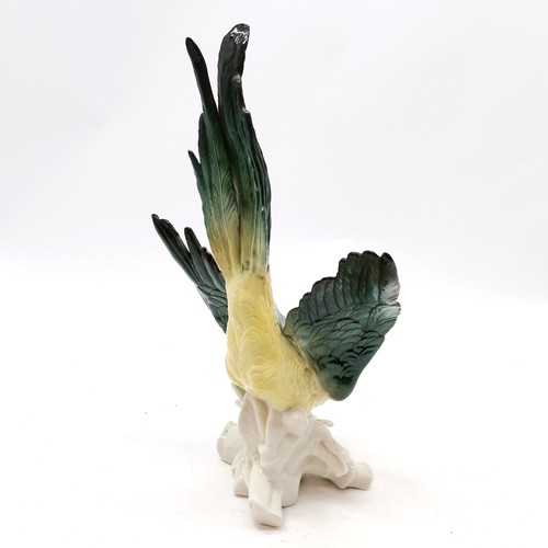 10 - German porcelain Karl Ens figure of a parrot on naturalistic base, in good condition, 37 cm high x 2... 