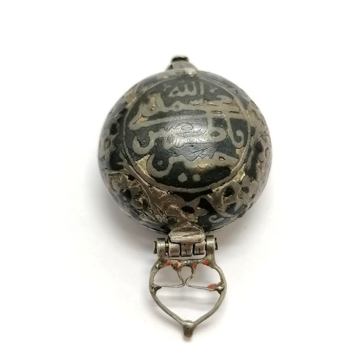 22 - Antique / early unmarked Indian silver niello Qibla pendant with minaret shaped bale & script to the... 