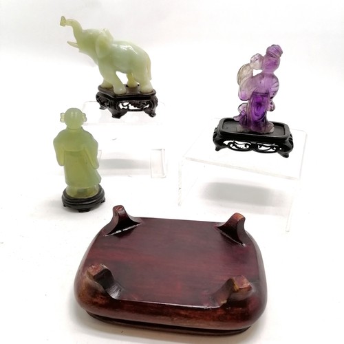 27 - Oriental hardstone hand carved jade figure on wooden base, hand carved amethyst quartz figure on woo... 