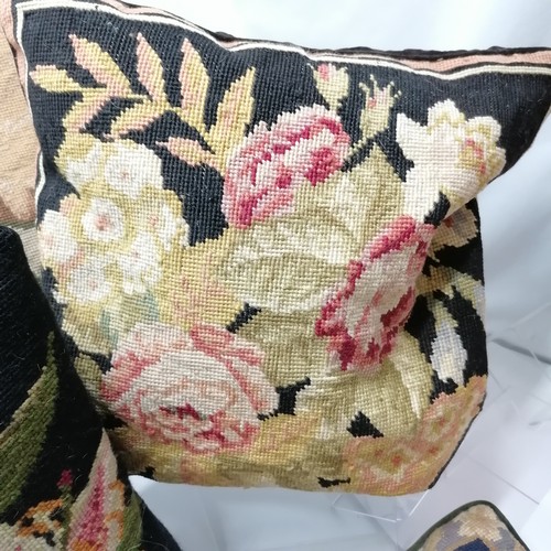 32 - Collection of seven assorted tapestry cushions, to include floral and animal patterns, 42 cm square.