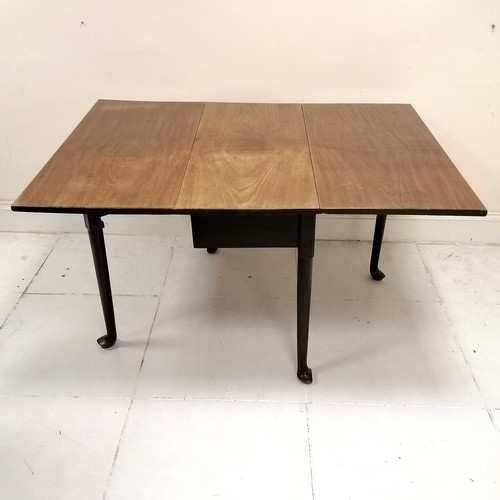 41 - Antique mahogany drop flap dining table, on pad feet, losses to pad feet, in used condition, 103 cm ... 