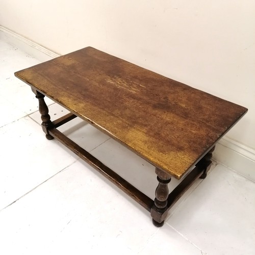 43 - Oak refectory style coffee table with stretchered and turned base, in good used condition, 107 cm wi... 