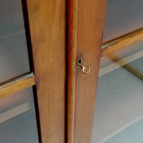 54 - Antique mahogany 2 door glazed 4 shelf bookcase, on bracket feet, in used condition, 100 cm wide x 4... 