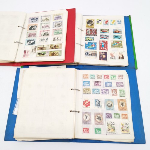 90 - 11 volumes of a world stamp collection - in mixed condition but many 1000's and well worth further i... 