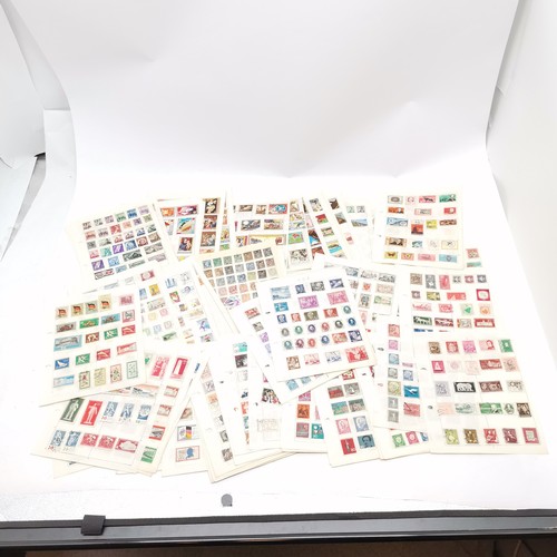 90 - 11 volumes of a world stamp collection - in mixed condition but many 1000's and well worth further i... 