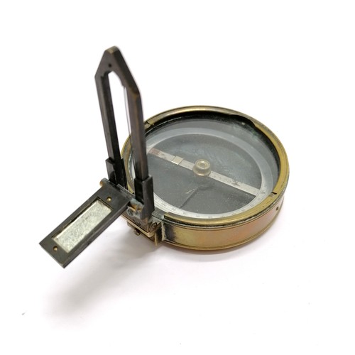 106 - Antique prismatic compass (7.4cm diameter & missing lens) retailed by Hirsbrunner & Co (Tientsin) in... 