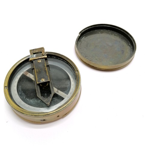 106 - Antique prismatic compass (7.4cm diameter & missing lens) retailed by Hirsbrunner & Co (Tientsin) in... 