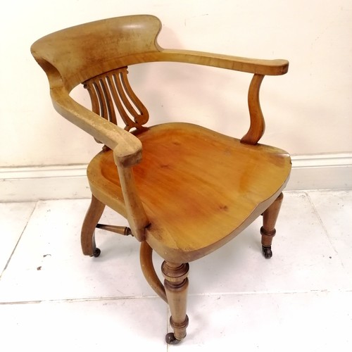 150 - Antique bow back desk chair, on turned legs terminating ceramic castors, in good condition, 53 cm wi... 