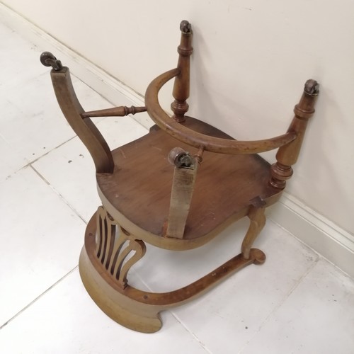 150 - Antique bow back desk chair, on turned legs terminating ceramic castors, in good condition, 53 cm wi... 