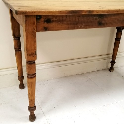 159 - Antique Rustic pine table, on turned legs, in used condition, 120 cm wide x 62 cm deep x 76 cm high.