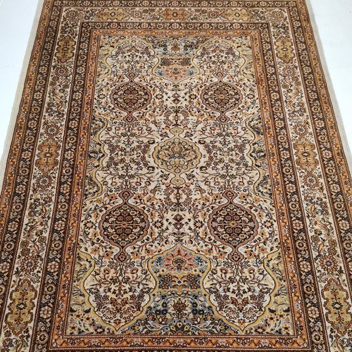 182 - Vintage orange & brown ground wool rug - 140cm x 196cm