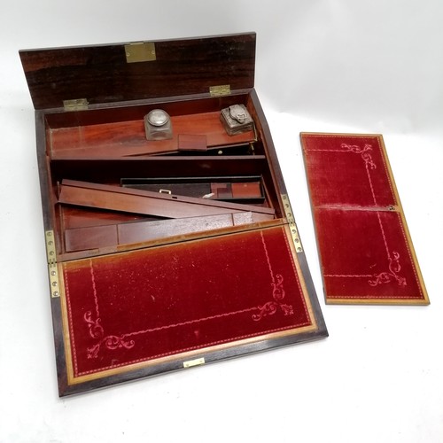 186 - Antique rosewood veneered writing slope with profuse mother of pearl decoration to top & has origina... 