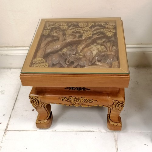 190 - Indian heavily carved teak carver chair, decorated with elephants walking through a forest, 67 cm wi... 