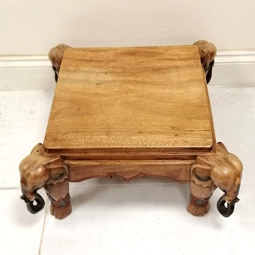 191 - Indian carved teak coffee table with carved elephants on each corner as supports, 65 cm square x  34... 