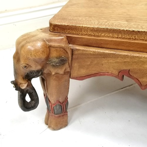 191 - Indian carved teak coffee table with carved elephants on each corner as supports, 65 cm square x  34... 