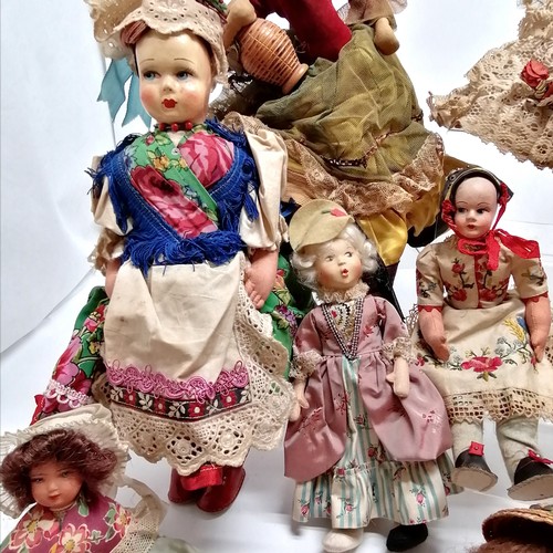 217 - A vintage collection of 18 costume dolls the talest 36cm high including Nistis Spanish doll, Peggy N... 