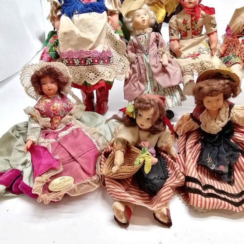 217 - A vintage collection of 18 costume dolls the talest 36cm high including Nistis Spanish doll, Peggy N... 