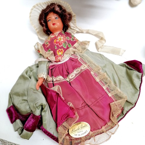 217 - A vintage collection of 18 costume dolls the talest 36cm high including Nistis Spanish doll, Peggy N... 