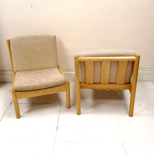 262 - Pair of Blonde Elm Ercol easy chairs, with original oatmeal coloured upholstered cushions. in good u... 