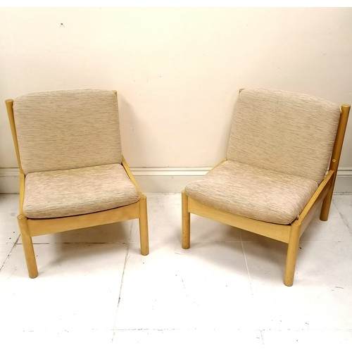 262 - Pair of Blonde Elm Ercol easy chairs, with original oatmeal coloured upholstered cushions. in good u... 