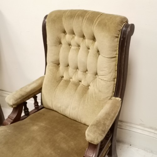 264 - Pair of Antique mahogany framed button and scroll back Library chairs, upholstered in a light green ... 