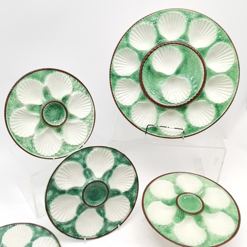 314 - Majolica style serving set comprising of large circular platter 33 cm diameter, t/w set of 6 smaller... 