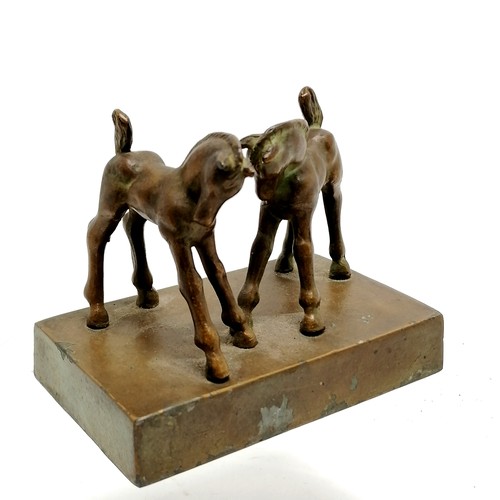 329 - Art Deco study of 2 foals - 10.5cm across x 9cm high ~ 1 horse slightly loose and slight losses to t... 