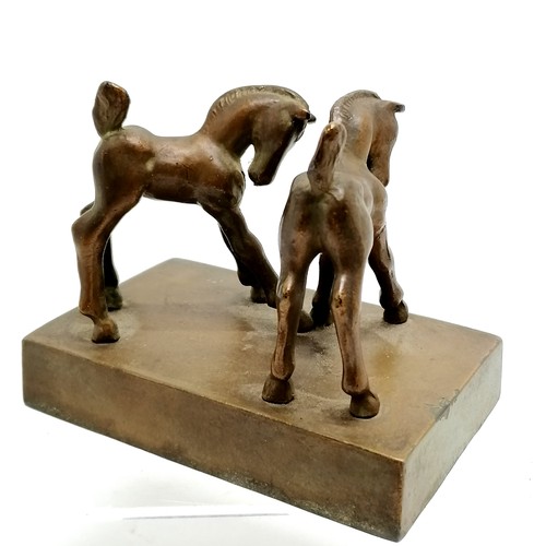 329 - Art Deco study of 2 foals - 10.5cm across x 9cm high ~ 1 horse slightly loose and slight losses to t... 