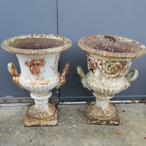 7 - Impressive pair of antique cast iron Garden urns with figural handles and floral swags, some losses,... 