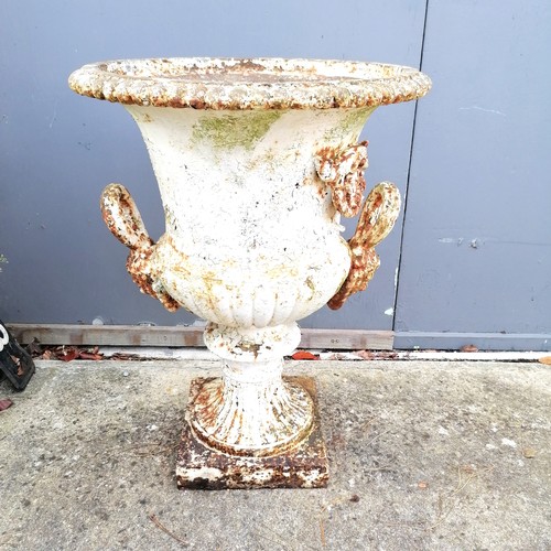 7 - Impressive pair of antique cast iron Garden urns with figural handles and floral swags, some losses,... 