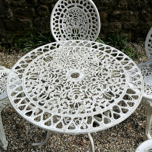 9 - White painted cast Aluminium Garden circular table and 6 chairs - table 66cm diameter