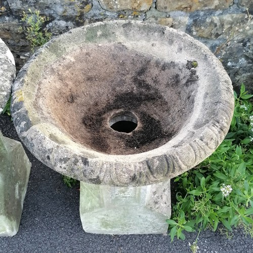 24 - Pair of garden concrete urns with fluted tops, resting on ecclesiastical inspired bases, 60 cm diame... 