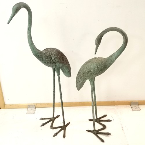 27 - Pair of bronze garden storks, with Verdigris finish, largest standing 113 cm high.