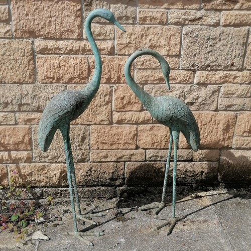 27 - Pair of bronze garden storks, with Verdigris finish, largest standing 113 cm high.