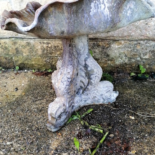 29 - Antique lead water feature of a putti figure standing on a shell above a dolphin base  total height ... 