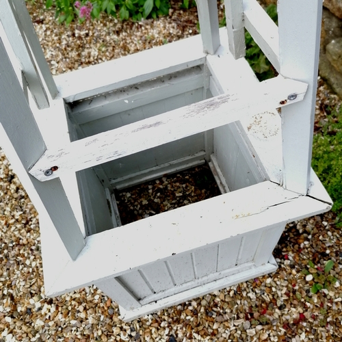 32 - Pair of green painted wooden square planters with attached obelisks - some slight losses and loose b... 