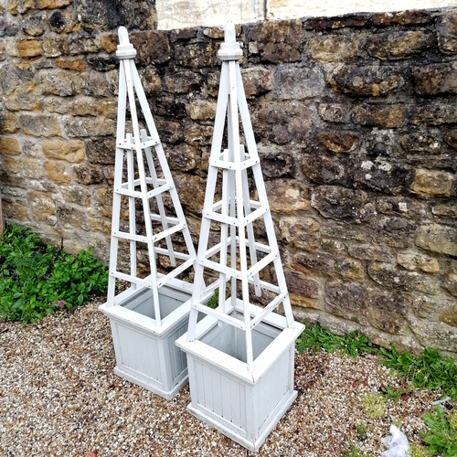 32 - Pair of green painted wooden square planters with attached obelisks - some slight losses and loose b... 