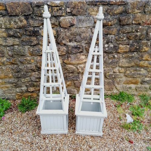 32 - Pair of green painted wooden square planters with attached obelisks - some slight losses and loose b... 