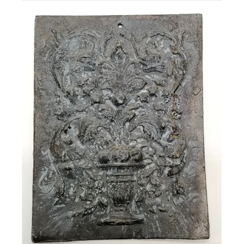 34 - Antique lead wall plaque decorated with an urn of flowers 26cm x 20cm- with good patination