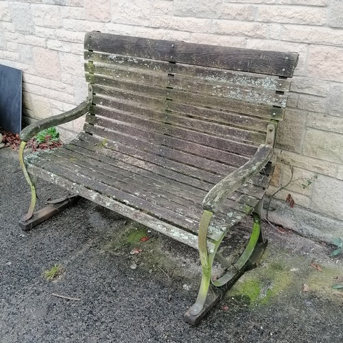 44 - Antique iron strap work high back bench with wooden slats and wooden sleigh feet 129cm long x 99cm h... 