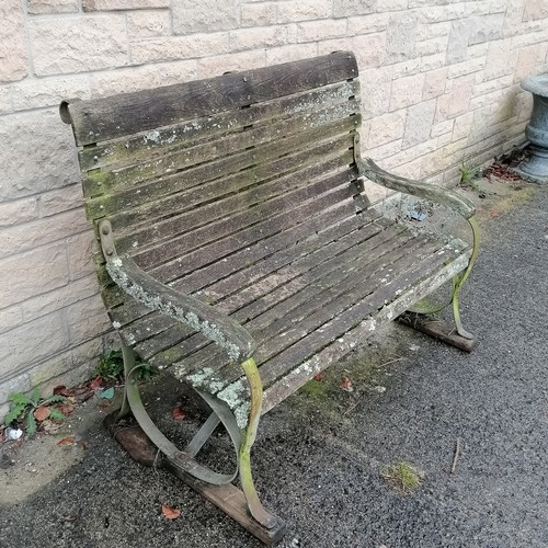 44 - Antique iron strap work high back bench with wooden slats and wooden sleigh feet 129cm long x 99cm h... 