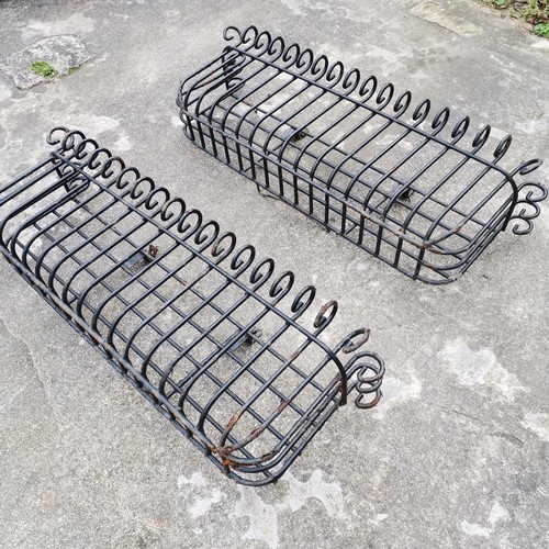 48 - Pair of iron work window boxes with a black coating 119cm wide x 37cm high x 25cm deep - no obvious ... 