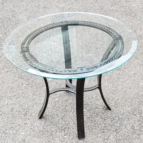 51 - Black metal framed circular glass topped table - 66cm diameter x 47cm high