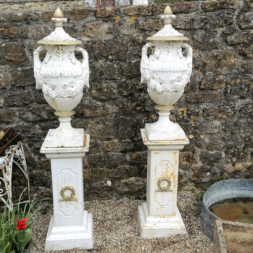 91 - Victorian pair of cast iron lidded urns on square based pedestals 175cm high bases 36cm x 36cm - no ... 