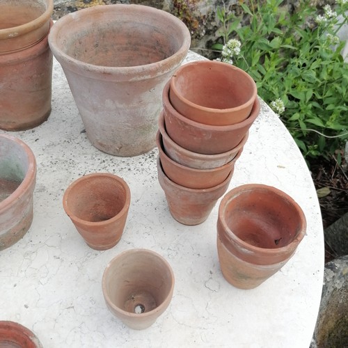 111 - Quantity of 23 terracotta pots and 1 dish tallest 20cm diameter x 18cm high