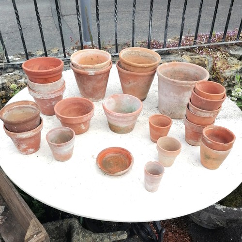 111 - Quantity of 23 terracotta pots and 1 dish tallest 20cm diameter x 18cm high