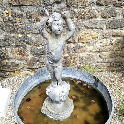 86 - Antique circular lead pond with swag decoration T/W a lead putti figure on a ball pedestal with 4 wa... 