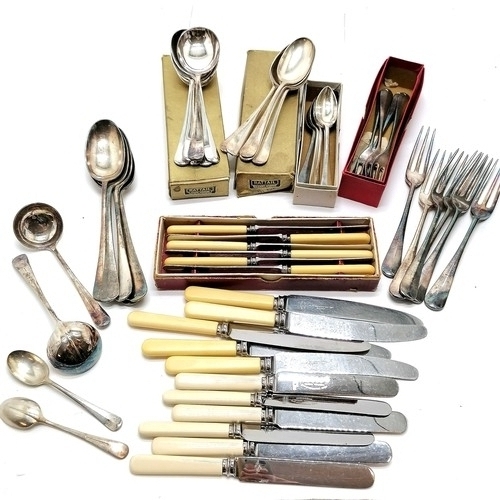 988 - Qty of silver plated rat-tail pattern cutlery t/w qty of tea & dinner knives (1 handle a/f) some wit... 