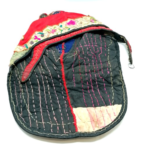 130 - Antique Oriental red silk embroidered hat with fringe and brocade detail - has obvious signs of colo... 