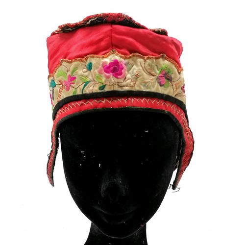 130 - Antique Oriental red silk embroidered hat with fringe and brocade detail - has obvious signs of colo... 